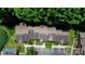 Overhead view showcasing the property's roof, parking area, and proximity to green spaces at 9216 Four Mile Creek Rd, Charlotte, NC 28277