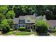 Charming townhomes with colorful facades, well-manicured landscaping, and inviting front entrances at 9216 Four Mile Creek Rd, Charlotte, NC 28277