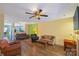 Spacious living room featuring hardwood floors, ample seating, and natural light at 9216 Four Mile Creek Rd, Charlotte, NC 28277