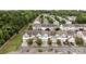 Aerial view showcases an expansive community with well-manicured lawns and tree-lined streets at 10207 Garmoyle St, Charlotte, NC 28277