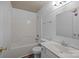 Bathroom featuring tub and shower combination and a single sink vanity at 10207 Garmoyle St, Charlotte, NC 28277