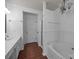 Well-lit bathroom showcasing a soaking tub, a shower, and a white vanity with ample counter space at 10207 Garmoyle St, Charlotte, NC 28277