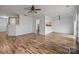 Bright living room with hardwood floors, open layout, and great flow for entertaining at 10207 Garmoyle St, Charlotte, NC 28277