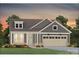 Charming single-Gathering home with craftsman details, a covered porch, and a two-car garage at 1022 Paddlers Way # 136, Belmont, NC 28012