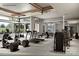 Well-equipped fitness center with treadmills, weights, stationary bikes, and large windows at 1022 Paddlers Way # 136, Belmont, NC 28012