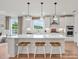 Bright kitchen featuring a large island with seating and stainless steel appliances at 1022 Paddlers Way # 136, Belmont, NC 28012