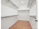 Spacious walk-in closet with shelves and rods for optimal organization at 1022 Paddlers Way # 136, Belmont, NC 28012