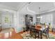 Bright dining room with a large table, decorative hutch, and stylish decor at 10405 Scotland Ave, Indian Land, SC 29707