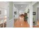 Inviting entryway with hardwood floors leading to a spacious living area at 10405 Scotland Ave, Indian Land, SC 29707