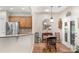 Open kitchen with stainless steel refrigerator and breakfast nook with outdoor access at 10405 Scotland Ave, Indian Land, SC 29707