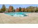 Enjoy this community pool with a concrete deck and black metal fence for a secure, fun time at 10405 Scotland Ave, Indian Land, SC 29707