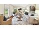 Comfortable living room with neutral decor, plush seating, and natural light at 1049 Regency Dr, Charlotte, NC 28211
