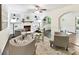 Stately living room featuring a beautiful fireplace, hardwood floors, and recessed lighting at 1049 Regency Dr, Charlotte, NC 28211
