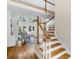 Grand entryway with staircase and view into the elegant living room at 10508 Old Wayside Rd, Charlotte, NC 28277