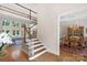 Grand foyer with staircase leading to the second floor overlooking a living room and dining room at 10508 Old Wayside Rd, Charlotte, NC 28277