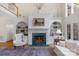 Elegant living room with fireplace, custom built-ins, and a bright, open layout at 10508 Old Wayside Rd, Charlotte, NC 28277