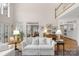 Bright and airy living room showcasing hardwood floors and natural light at 10508 Old Wayside Rd, Charlotte, NC 28277