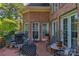 Spacious brick patio with outdoor seating and grill, perfect for entertaining at 10508 Old Wayside Rd, Charlotte, NC 28277