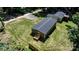 Aerial view of a home featuring a wooden deck and manicured lawn at 110 Lambert Ln, Statesville, NC 28677