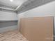 This walk-in closet features white shelves, providing ample storage space for clothes and accessories at 110 Lambert Ln, Statesville, NC 28677