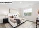 Cozy bedroom featuring a plush bed, soft lighting, large window, and modern décor for a relaxing retreat at 121 S Shayna Rd, Troutman, NC 28166