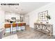 Bright kitchen with a large island, modern pendant lighting, stainless steel appliances, and bar stool seating at 121 S Shayna Rd, Troutman, NC 28166