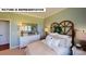 Bright bedroom featuring a decorative headboard, dresser, mirror, and comfortable bed with soft pillows at 124 S Shayna Rd, Troutman, NC 28166