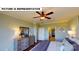 Charming main bedroom with soft colors, a ceiling fan, and doorway to the ensuite bathroom at 124 S Shayna Rd, Troutman, NC 28166