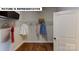 Walk-in closet featuring wood-look flooring, wire shelving, and ample storage space at 124 S Shayna Rd, Troutman, NC 28166