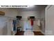 Walk-in closet with ample hanging space, wire shelving, and wood-look flooring at 124 S Shayna Rd, Troutman, NC 28166