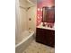 Bathroom featuring vanity, shower, and decorative ceramic tile at 1313 Lower Dallas Hwy Hwy, Dallas, NC 28034