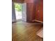 Bedroom featuring hardwood floors, closet, and access to the rear deck at 1313 Lower Dallas Hwy Hwy, Dallas, NC 28034