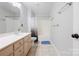 Neutral bathroom featuring a tub and shower combination and spacious vanity at 139 Forest Walk Way, Mooresville, NC 28115