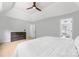 Bright bedroom with tray ceiling, neutral walls and carpet, dresser and ensuite at 139 Forest Walk Way, Mooresville, NC 28115