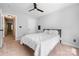 Bright bedroom features neutral walls and carpet, along with a ceiling fan at 139 Forest Walk Way, Mooresville, NC 28115