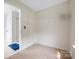 Walk-in closet with shelving for storage and organization; carpeted floors at 139 Forest Walk Way, Mooresville, NC 28115