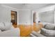 Inviting living room with hardwood floors, neutral paint, and access to other rooms at 139 Forest Walk Way, Mooresville, NC 28115