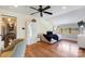 Bright bedroom with white furniture, wood floors, and natural light at 14701 Cabarrus Rd, Mint Hill, NC 28227