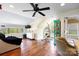Spacious bonus room with hardwood floors and unique furniture at 14701 Cabarrus Rd, Mint Hill, NC 28227