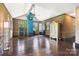 Bright bonus room with hardwood floors, exposed brick, and abundant natural light at 14701 Cabarrus Rd, Mint Hill, NC 28227