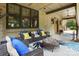 Spacious front porch with cozy seating and decorative rug at 14701 Cabarrus Rd, Mint Hill, NC 28227