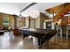 Relaxing game room area featuring a pool table and comfortable seating at 14701 Cabarrus Rd, Mint Hill, NC 28227