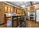 Well-equipped kitchen with stainless steel appliances and an island with bar seating at 14701 Cabarrus Rd, Mint Hill, NC 28227