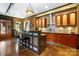 Stylish kitchen with modern cabinetry, stainless steel appliances, and an island with bar seating at 14701 Cabarrus Rd, Mint Hill, NC 28227