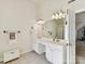 Well-lit bathroom with double vanity, tub and shower at 1564 Trippett Nw St, Concord, NC 28027