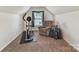 Bright bedroom space with elliptical machine, sitting area, and natural light at 1564 Trippett Nw St, Concord, NC 28027