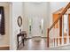 Welcoming foyer with high ceilings, hardwood floors, and elegant decor at 1564 Trippett Nw St, Concord, NC 28027