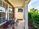 Inviting front porch with charming decor and a comfortable seating area at 1564 Trippett Nw St, Concord, NC 28027