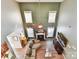 Bright and spacious living room with high ceilings, a fireplace, large windows, and a comfortable sectional sofa at 1564 Trippett Nw St, Concord, NC 28027