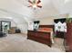 Spacious main bedroom with cathedral ceiling, sitting area, and natural lighting at 1564 Trippett Nw St, Concord, NC 28027